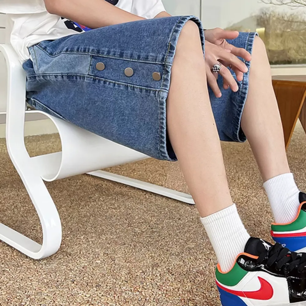Distressed Button Paneled Denim Shorts